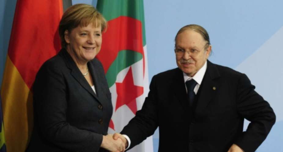 Angela Merkel with Abdelaziz Bouteflika in Berlin in 2010.  By JOHN MACDOUGALL AFPFile