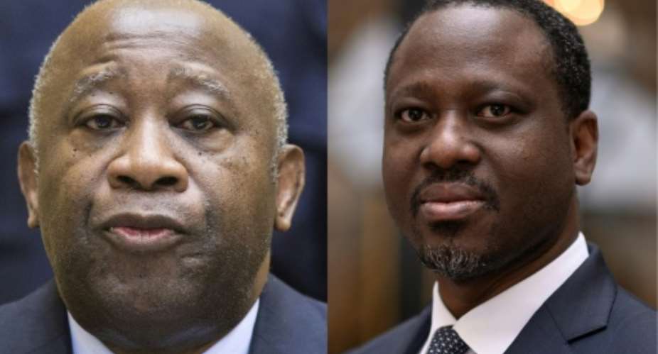 Anger: Former Ivory Coast president Laurent Gbagbo, left, and former rebel leader and ex-premier Guillaume Soro.  By MICHAEL KOOREN, Lionel BONAVENTURE POOLAFP