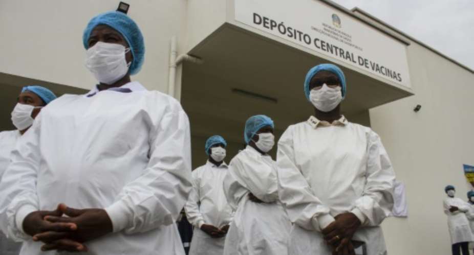 Angolan health workers were vaccinated almost immediately after the doses were unloaded.  By Osvaldo Silva AFP