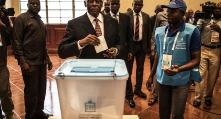 Angola's Jose Eduardo dos Santos, shown here voting in last year's election won by Joao Lourenco, says he wants to be remembered for his dignified exit from the office he held since 1979.  By MARCO LONGARI AFP