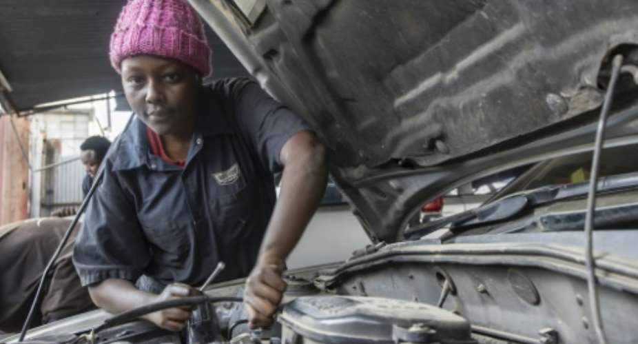 Annastacia Mwende discovered her love of garage work thanks to charity CFK Africa.  By SIMON MAINA (AFP)