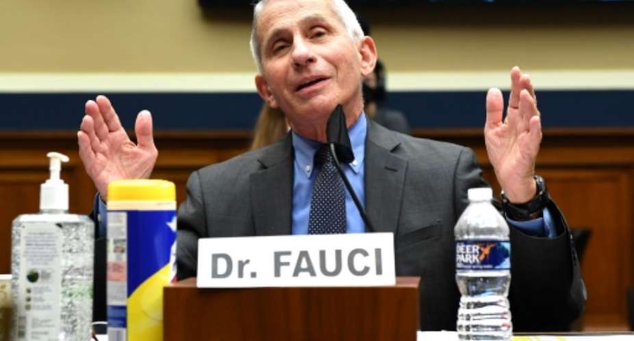 Anthony Fauci, director of the National Institute of Allergy and Infectious Diseases, warned that the US could see 100,000 new coronavirus cases a day.  By POOL GETTY IMAGESAFP