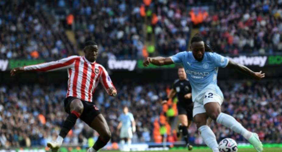 Antoine Semenyo (R) scores the fourth goal for Manchester City in a 5-3 Premier League win over Sunderland..  By PETER POWELL (AFP)