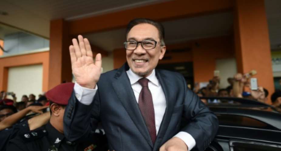 Anwar was originally jailed 20 years ago by then-premier Mahathir Mohamad, on what supporters insisted were trumped up sodomy charges.  By MOHD RASFAN AFP