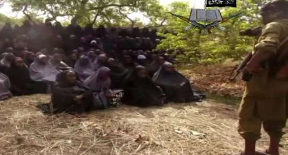 A screengrab taken on May 12, 2014 from a video released by Boko Haram shows Nigerian girls being held in an undisclosed location.  By  Boko HaramAFPFile