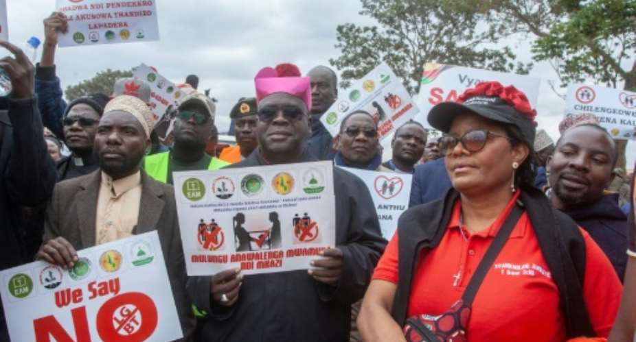 Archbishop Desmond Tambala led protesters marching through Lilongwe.  By Amos Gumulira AFP