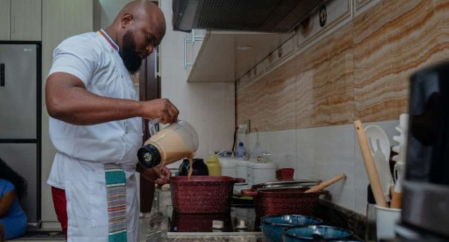 Archi Dimosi is part of a new generation of chefs taking ownership of traditional recipes in the Democratic Republic of Congo.  By Hardy BOPE (AFP)