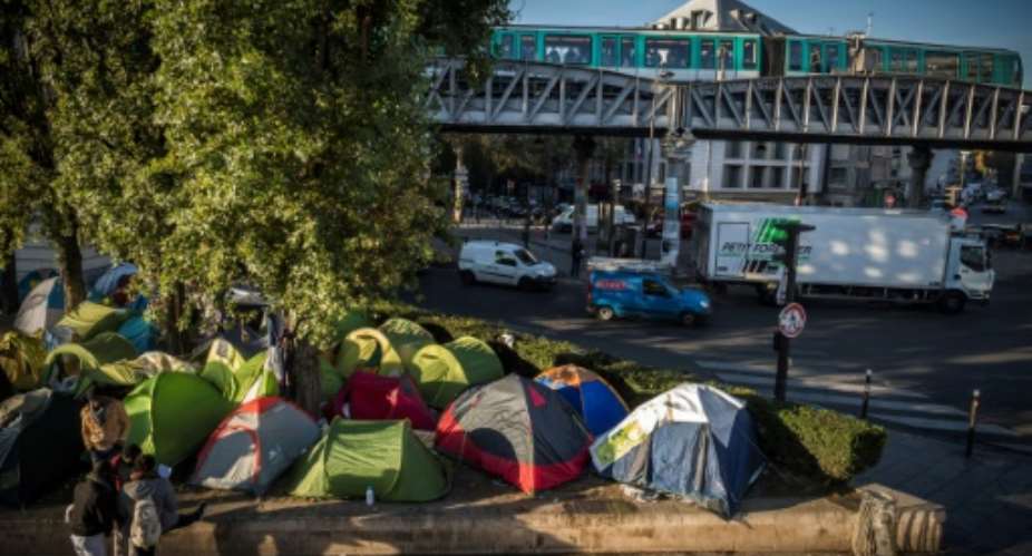 Around 500 migrants are estimated to be living in the Calais area, with hundreds more living in Paris.  By LIONEL BONAVENTURE (AFP)