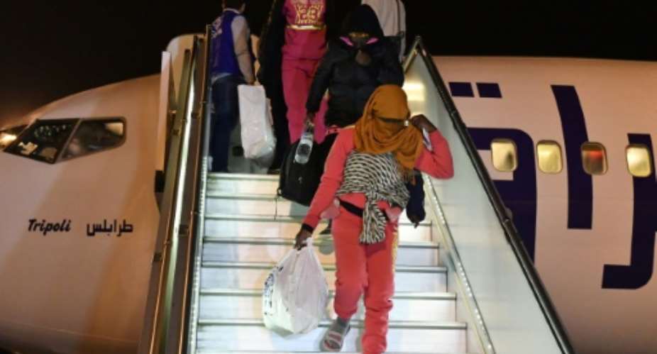 Around 600 Ivorian migrants are being flown home from Libya this week with a first tranche of 150 arriving in Abidjan on Monday.  By ISSOUF SANOGO AFP