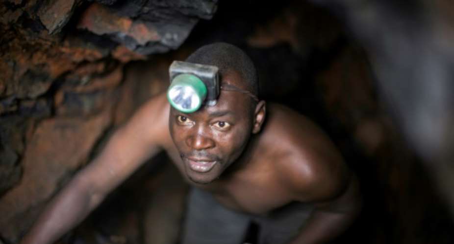 Artisanal miners in the vast central African country often work in difficult conditions, ignoring safety norms.  By GRIFF TAPPER AFPFile