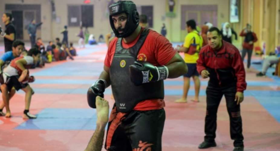 As Egyptians obsessively follow national football team preparations for the World Cup, Moataz Radi prepares for the kung fu world championship in a sport that lacks sponsors and supporters.  By MOHAMED EL-SHAHED AFP