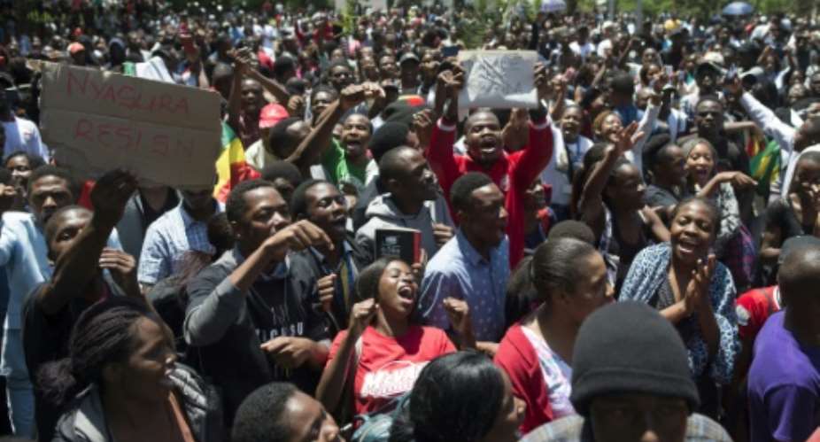 As Robert Mugabe's 37-year rule drew to a close, students rallied on November 20 to demand the University of Zimbabwe withdraw the doctorate it controversially awarded to his wife, Grace.  By - AFP