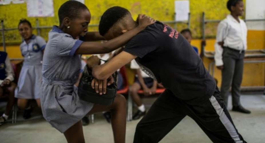 As well as teaching school girls how to defend themselves, instructors from Action Breaks Silence also advise girls on how to read and react to potentially risky situations.  By GULSHAN KHAN AFP