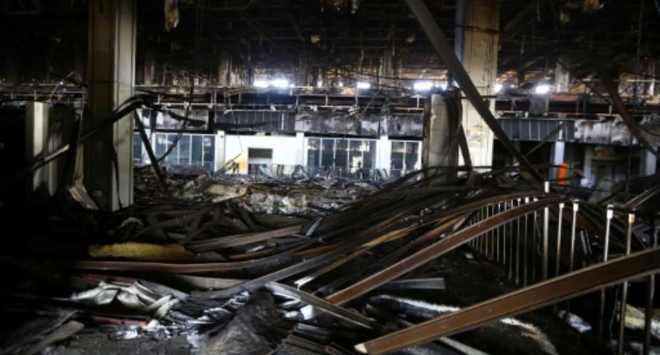 The damaged interior of the main building at Tripoli international airport on August 26, 2014.  By Mahmud Turkia AFP
