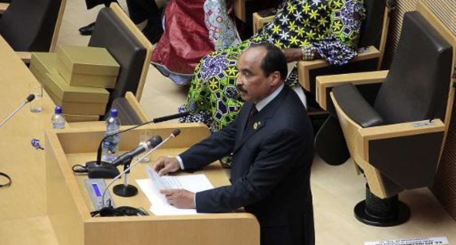 Mauritanian President Mohamed Ould Abdel Aziz delivers a speech at the 22nd African Union AU summit in Addis Ababa on January 31, 2014.  By Solan Gemechu AFP