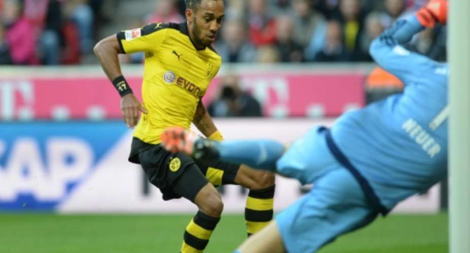 Dortmund's striker Pierre-Emerick Aubameyang L scores against Bayern Munich on October 4, 2015.  By Christof Stache AFP