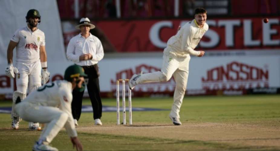 Australias Matt Renshaw (R) delivers a ball on day four of the first Test match against South Africa in Durban.  By Marco Longari (AFP)