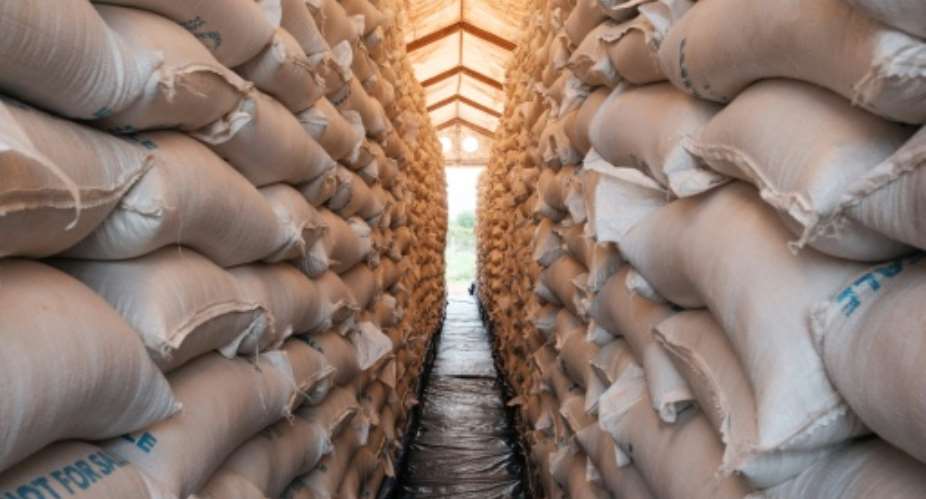 Bags of sorghum from the World Food Program sat in a warehouse in Maban, South Sudan, in August 2025.  By GUY PETERSON (AFP/File)
