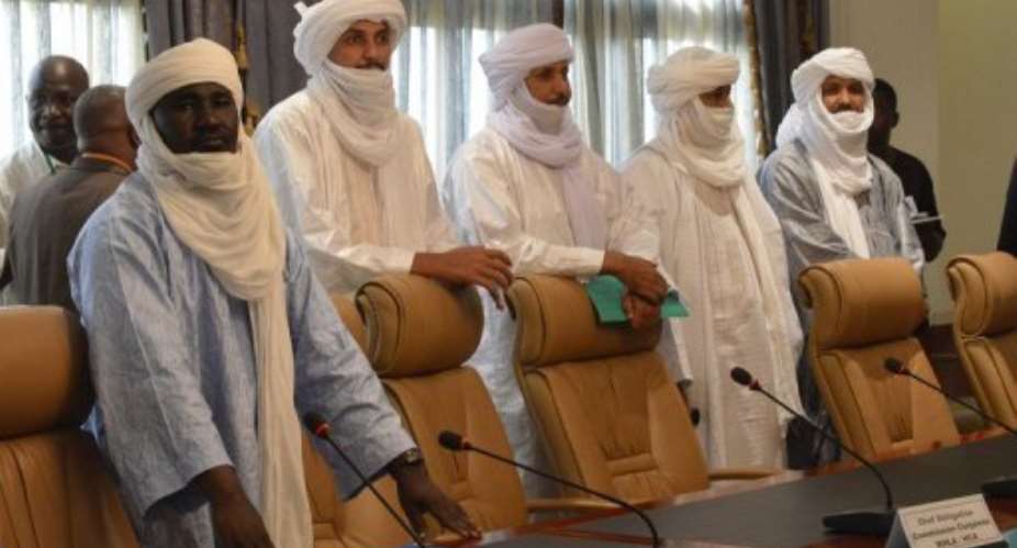 Tuareg delegates arrive to meet a Mali government delegation in Ougadougou, Burkina Faso, on June 10, 2013.  By Ahmed Ouoba AFPFile