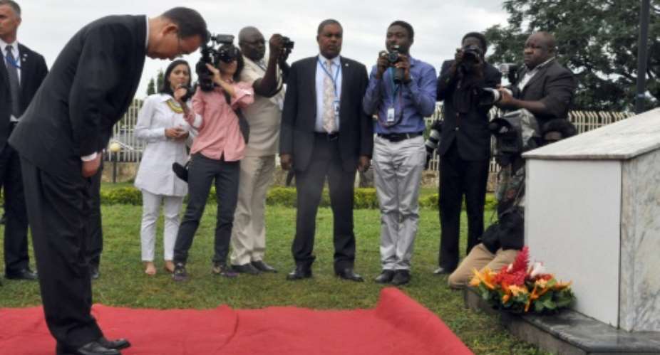 United Nations Secretary General Ban Ki-moon prays after laying a wreath to commemorate the fourth anniversary of a deadly attack on the global body by Boko Haram militants, in Abuja, on August 24, 2015.  By - AFP