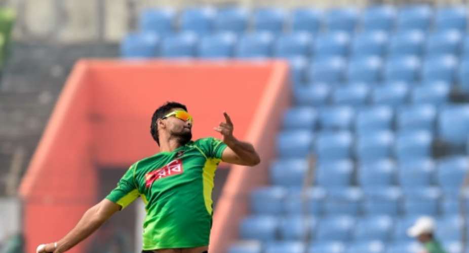 Bangladesh cricket captain Mashrafe Bin Mortaza delivers a ball during a team training session at the Sheikh Abu Naser Stadium in Khulna on January 14, 2016.  By Munir Uz Zaman AFPFile