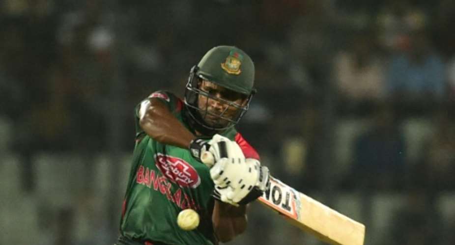 Bangladeshi cricketer Imrul Kayes plays a shot during the first one day international (ODI) cricket match against Zimbabwe at the Sher-e-Bangla National Cricket Stadium in Dhaka on October 21, 2018.  By MUNIR UZ ZAMAN (AFP)