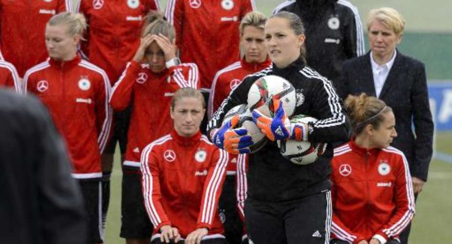 the German women's football team gets ready for a team picture on May 25, 2015 in Wollerau, Switzerland, ahead of the FIFA Womens football World Cup 2015 in Canada.  By Fabrice Coffrini AFPFile