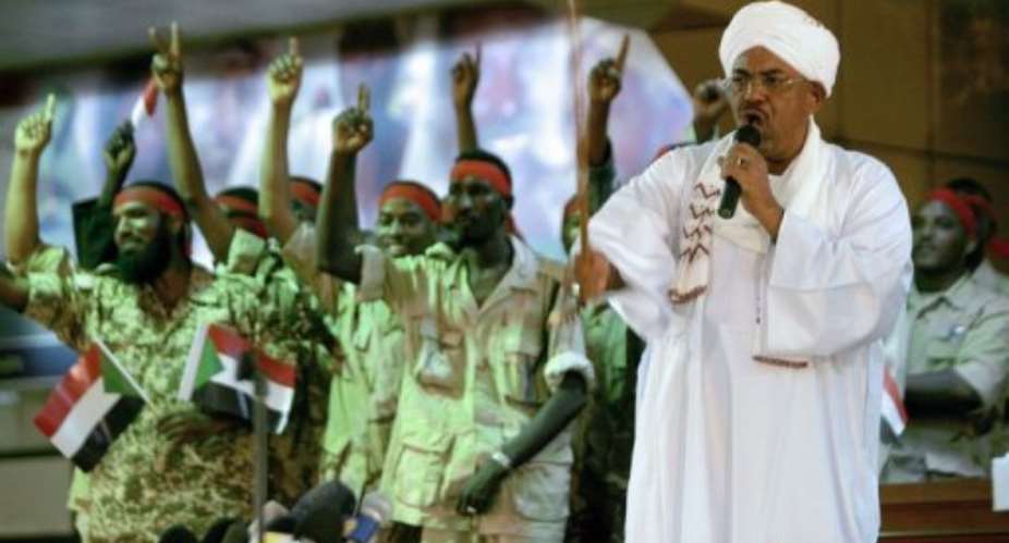 Sudanese President Omar al-Bashir speaks at the National Congress Party headquarters.  By Ashraf Shazly AFP