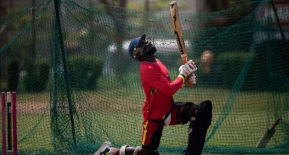 Batsman Kenneth Waiswa was among those training at the Kampala cricket ground.  By Badru Katumba (AFP)