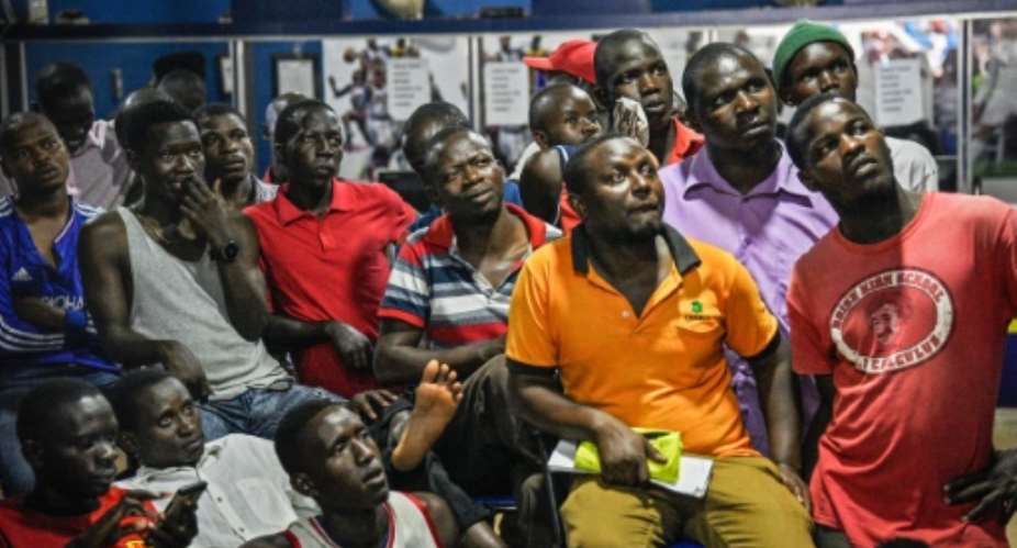 Beautiful game? Young Ugandans are betting more and more on football. Gambling has never been easier, raising concerns about addiction.  By Isaac Kasamani AFP