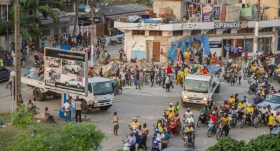 Beautifying Benin's economic hub Cotonou means demolishing the many small businesses sprawling onto public spaces.  By YANICK FOLLY AFPFile