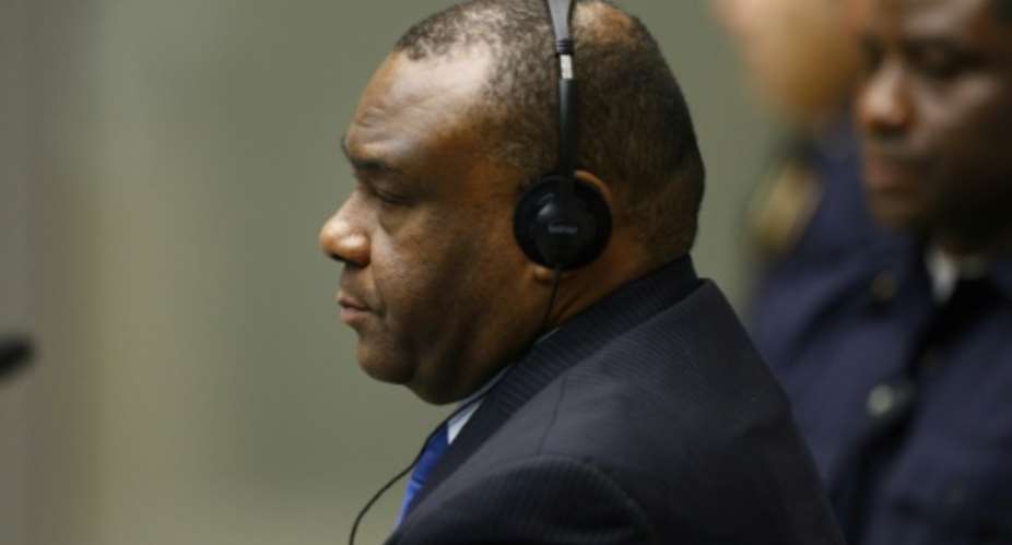 Former Congolese vice-president Jean-Pierre Bemba sits in the courtroom of the International Criminal Court ICC in The Hague on June 21, 2016.  By Michael Kooren PoolAFP