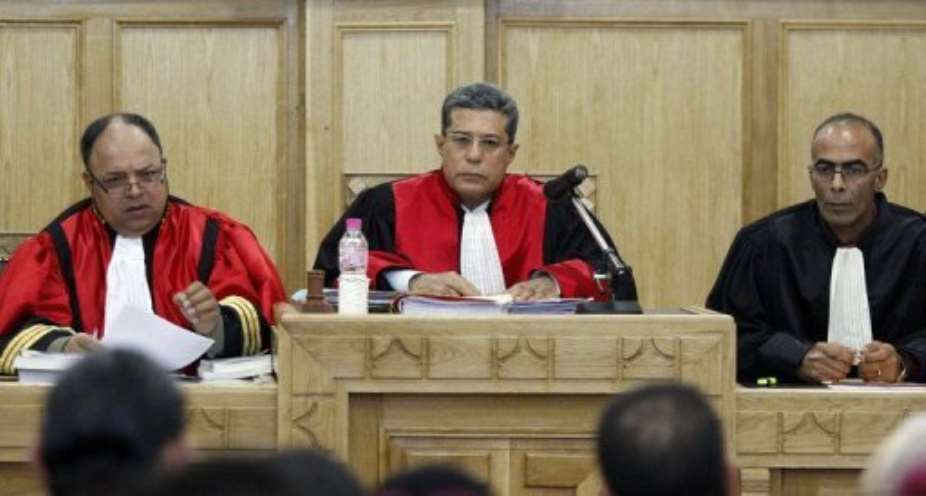 Tunisian military judge Hedi Ayari C addresses a military court.  By Salah Habibi AFPFile