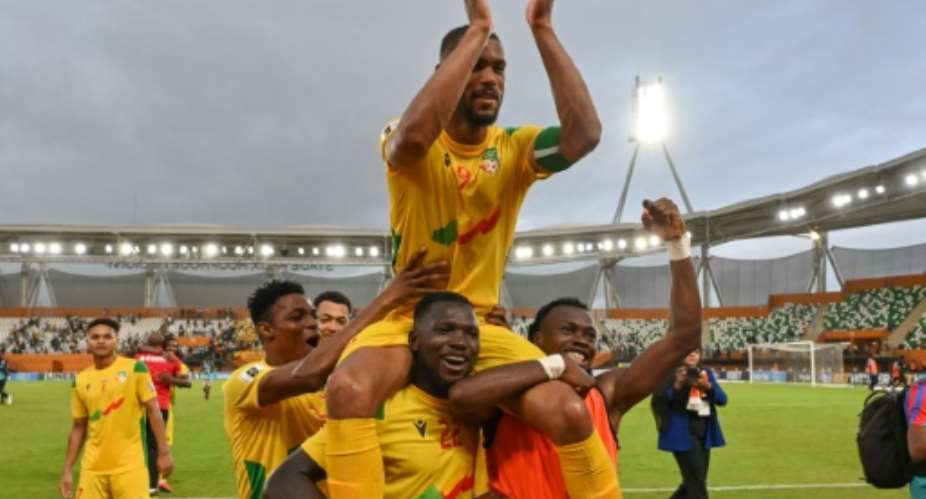 Benin captain and match-winner Steve Mounie (C) celebrates a 2026 World Cup qualifying victory over Nigeria in Abidjan.  By Issouf SANOGO (AFP)