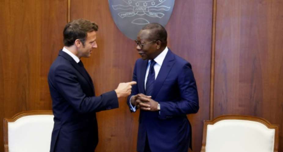 Benin leader Patrice Talon R made his comment during a visit by French President Emmanuel Macron L to Cotonou.  By Ludovic MARIN AFP