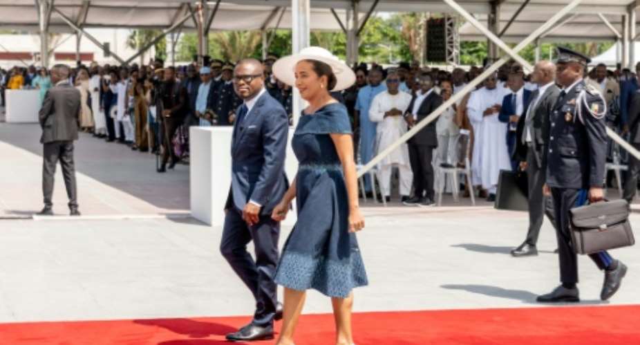 Benins new president, Romuald Wadagni, arrived at his inaugraration with his wife, First Lady Nathalie Villette-Wadagni.  By yanick folly (AFP)