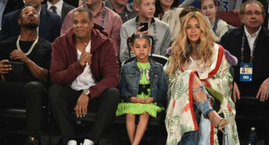 Beyonc Knowles and Jay Z, pictured with their daughter in 2017, were a part of an all-star line-up at a concert in Johannesburg to honour the life and legacy of Nelson Mandela.  By Theo Wargo GETTY IMAGES NORTH AMERICAAFPFile