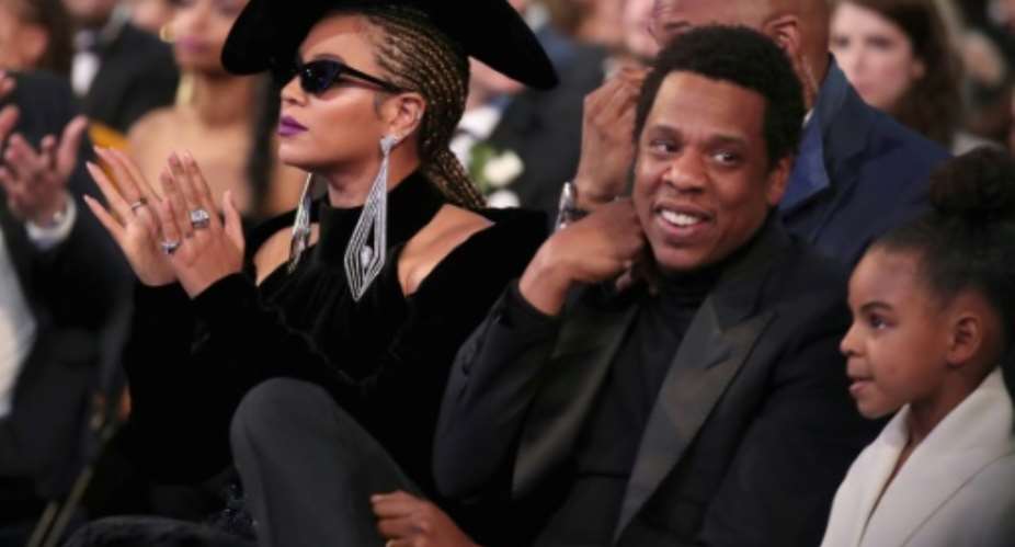 Beyonce and her husband Jay Z, pictured with their daughter Blue Ivy Carter, will headline an anti-poverty music festival in Johannesburg, South Africa.  By Christopher Polk GETTY IMAGES NORTH AMERICAAFPFile
