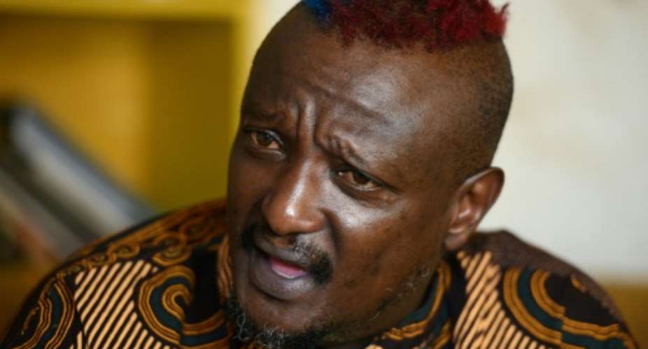 Binyavanga Wainaina, pictured in an AFP interview in January 2014, shortly after he declared that he was gay.  By SIMON MAINA AFP