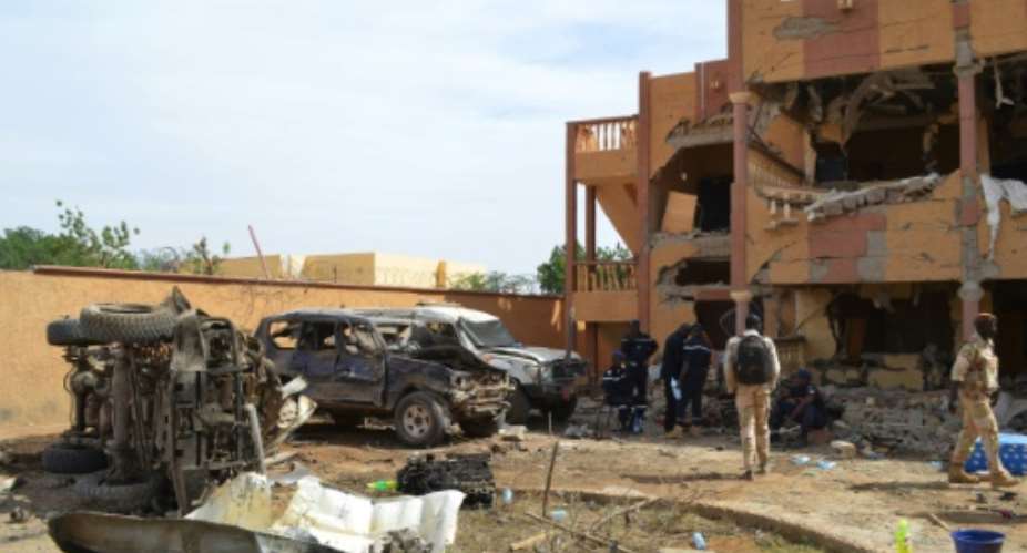 Blast: Aftermath of a suicide car bomb in Gao, northern Mali, last November that targeted a residential area used by UN sub-contractors. Three civilians were killed and around 30 were injured.  By STR AFP