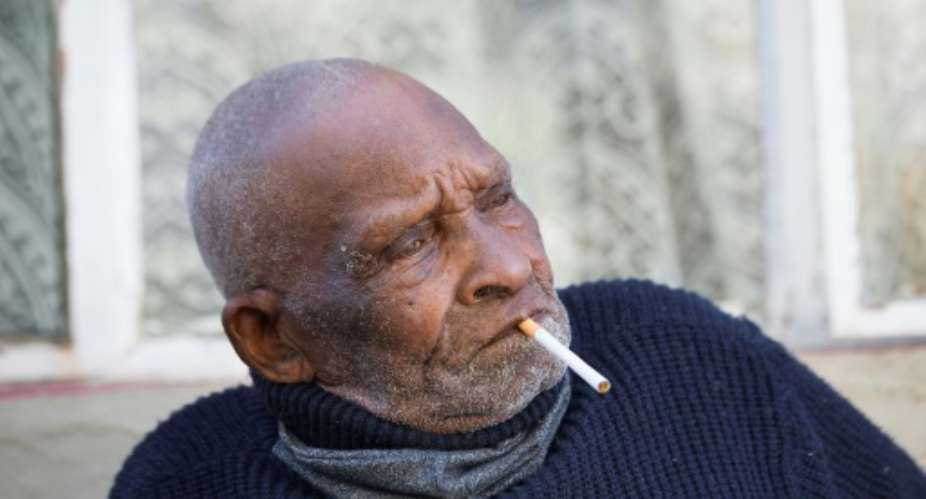 Blom was born in 1904 in the rural town of Adelaide and despite his great age still enjoys a cigarette.  By RODGER BOSCH AFP