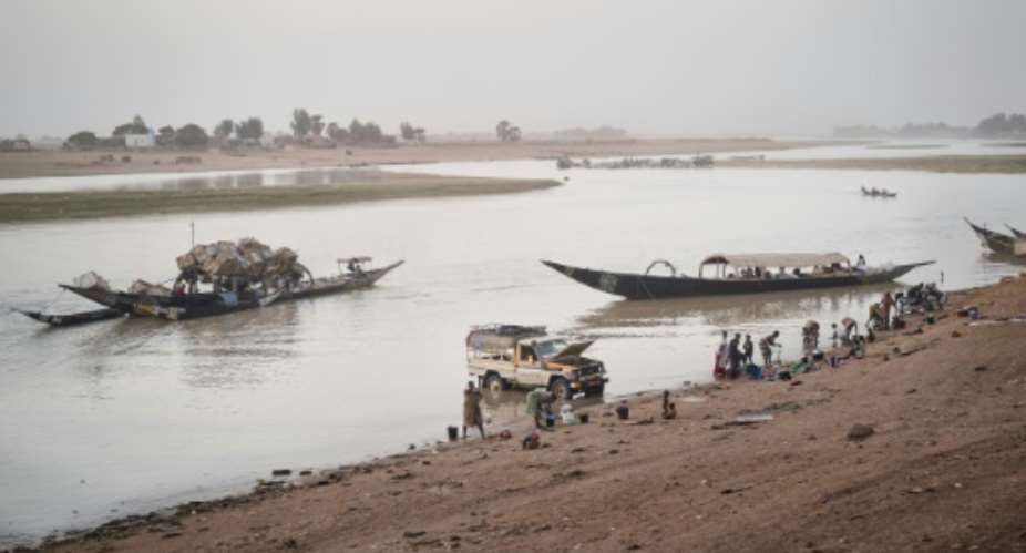 Boats along the Bani river in Mopti, situated in the Inner Niger Delta.  By MICHELE CATTANI (AFP)