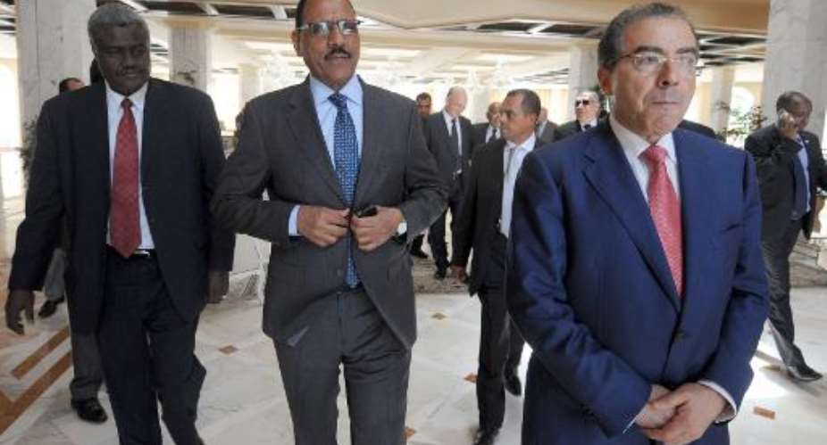 File photo shows then Nigerien Minister of Foreign Affairs Mohamed Bazoum C with Tunisian counterpart Mongi Hamdi R and Chadian counterpart Faki Mahamat L in the Tunisian city of Hammamet on July 14, 2014.  By Fethi Belaid AFPFile
