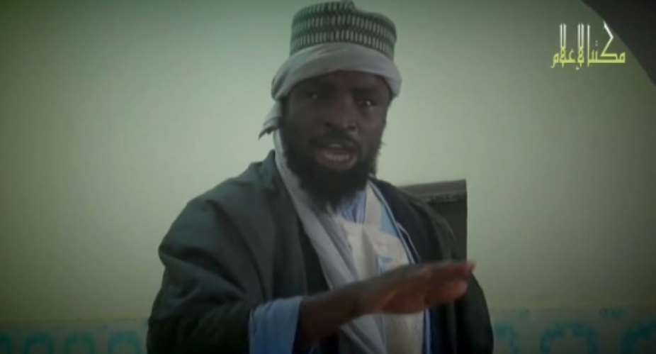 Boko Haram leader Abubakar Shekau, seen here in a previous video released by the Islamist group, had been wounded in a an air strike last month, according to the Nigerian army.  By  Boko HaramAFPFile