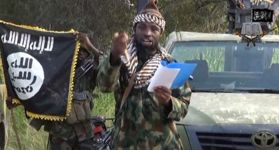 A screen grab from a Boko Haram video shows leader Abubakar Shekau speaking at an undisclosed location.  By  Boko HaramAFP