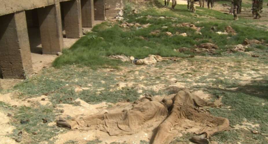This photo taken on March 20, 2015 shows bodies found near the city of Damasak after it was freed from Boko Haram Islamists.  By Abba Ali Kaya AFPFile