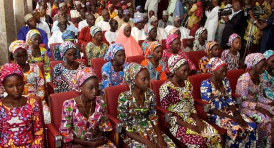 Boko Haram stormed a school in Chibok, Nigeria, in 2014 and kidnapped 276 teenaged girls of whom 21 were released in October pictured and another 82 at the weekend.  By Philip OJISUA AFPFile