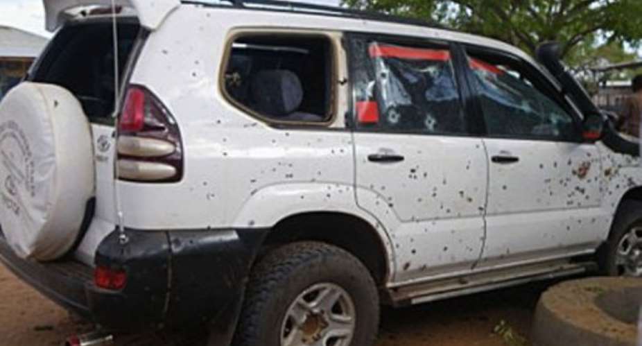 A car punctured with bullet holes is pictured after a suicide bomber blew himself up.  By  (AFP)