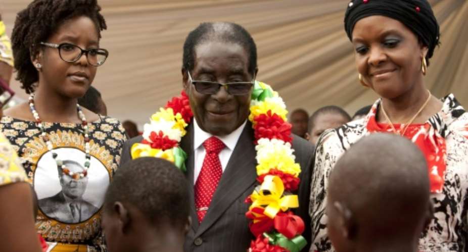 Bona Chikore joined her mother Grace Mugabe to celebrate President Robert Mugabe's 91st birthday in 2015.  By JEKESAI NJIKIZANA AFP