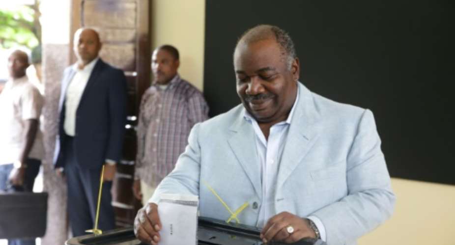 Bongo is shown casting his ballot on Saturday. Gabon has been ruled by the same political dynasty for nearly half a century.  By Joel TATOU AFP